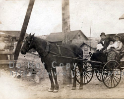 A Finnish family dressed up in their Sunday best, possibly on their way to church or another community event. ca. 1913 Family