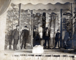 Entertainment could be found in the form of live theatrical productions. Actors posing on stage around 1910. Actors