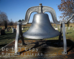 The original church bell has been preserved in the cemetery. Church bell
