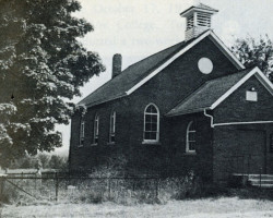 The Johnstone United Church was one of two churches in the area. This building, which replaced an earlier structure, was built in 1920 and demolished in 1969. The location is marked by a cairn. Church