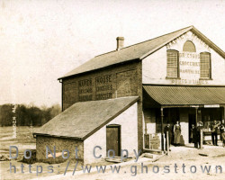 The local general store "Napier House" around 1910. A sign advertising 'electric beans' is hanging from the front. Store