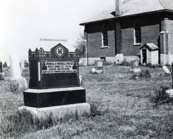 The Salem cemetery with a partial view of the church in the right Photo of cemetery and church