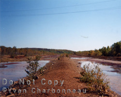 The far eastern end of the yards. Not even a stick has attempted to grow near the former rail and ore beds. Photo of rail beds