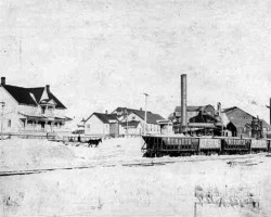 To the right is a northeast view of the smelter from the CPR line. The building on the far left was the smelter superindentent's residence. Photo of townsite
